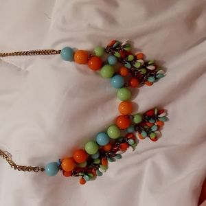 '70s themed gumball looking necklace